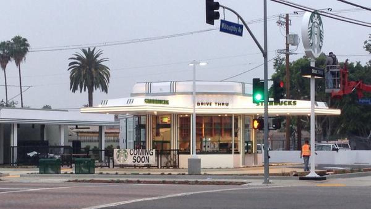 The renovated gas/caffeine station at Highland and Willoughby is now a Starbucks.