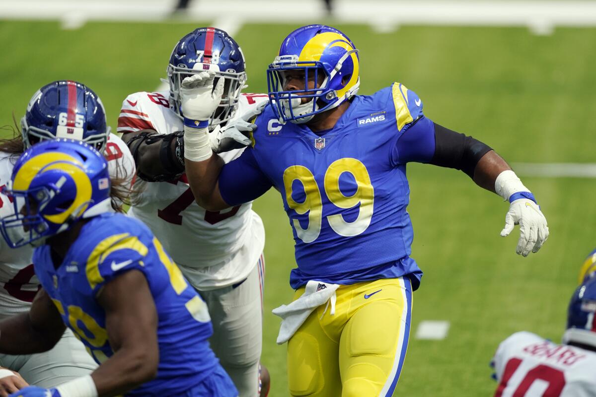 Rams defensive end Aaron Donald, right, works against the New York Giants on Oct. 4.
