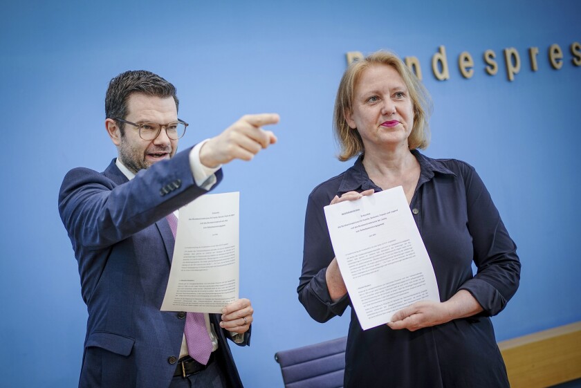 Lisa Paus, Federal Minister of Family Affairs, and Marco Buschmann, Federal Minister of Justice, present the key points paper on the Self-Determination Act at the Federal Press Conference in Berlin, Germany, Thursday, June 30, 2022. The law is intended to replace the long-disputed Transsexuals Act of 1980. Among other things, the aim is to reduce the hurdles to changing one's gender. (Kay Nietfeld/dpa via AP)