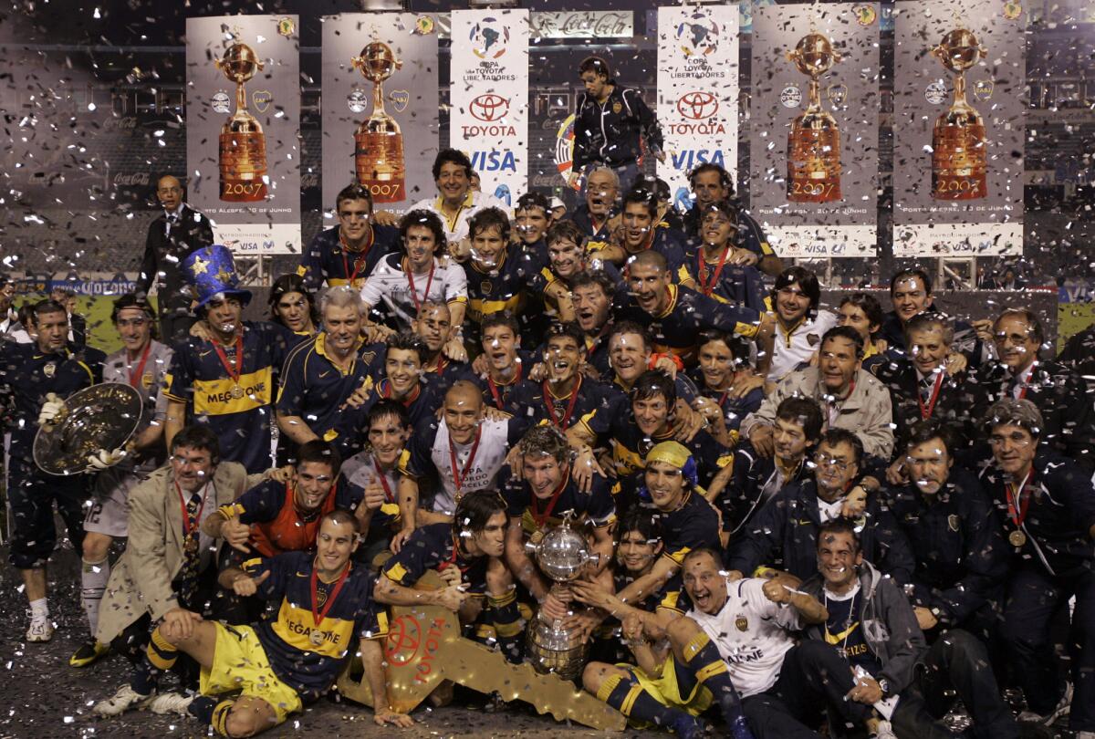 Argentina's Boca Juniors team celebrate after winning the Copa Libertadores final game at the Olimpico stadium, in Porto Alegre, Brazil, Wednesday, June 20, 2007. Boca Juniors won the championship 5-0 on aggregate after the final game ended 2-0. (AP Photo/Silvia Izquierdo) ORG XMIT: POA105