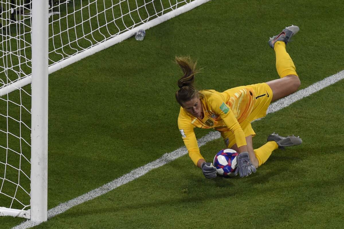 United States' goalkeeper Alyssa Naeher saves a penalty kick during the France 2019 Women's World Cup semi-final football match between England and USA, on July 2, 2019, at the Lyon Satdium in Decines-Charpieu, central-eastern France.