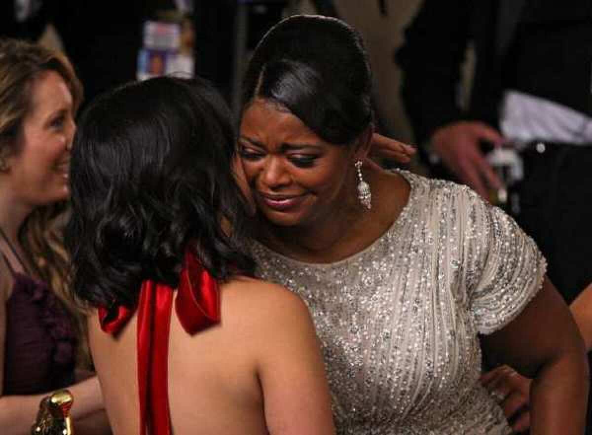 Octavia Spencer, being congratulated for winning an Oscar in February for her role in "The Help," has been invited to join the academy.