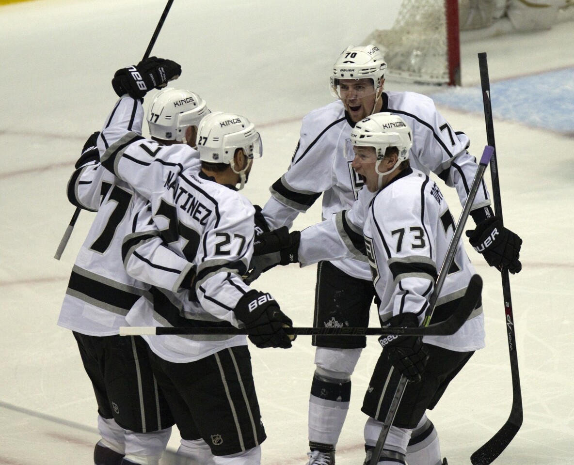 Kings celebrate a first-period goal by defenseman Alec Martinez against the Ducks during Game 2 of the Western Conference semifinals at Honda Center. The Kings won the game, 3-1, to take a 2-0 series lead.