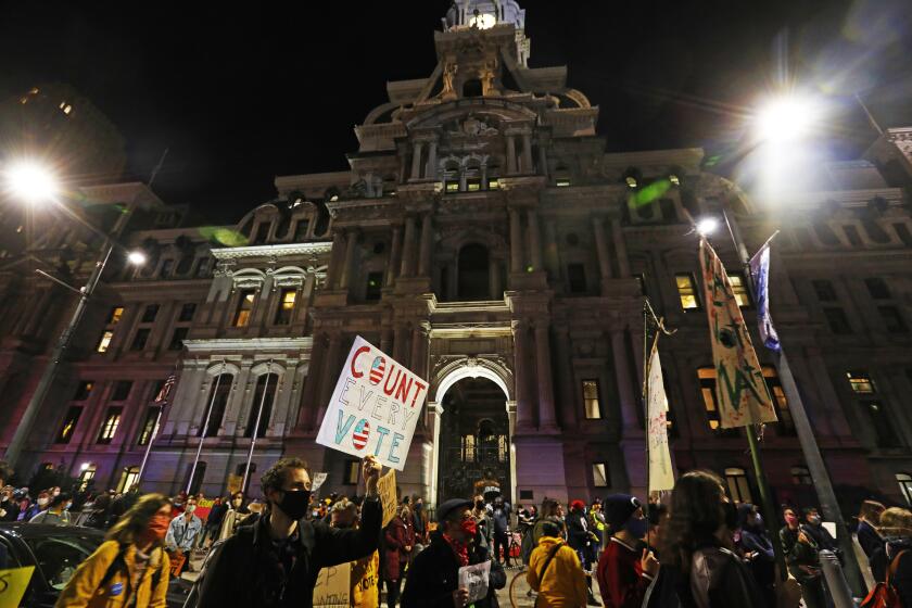 Philadelphia, Pennsylvania-Nov. 4, 2020-Protesters gather and march at City Hall in Philadelphia calling for all votes to be counted and shouting "Black Lives Matter," on Nov. 4, 2020, as the votes continue to be counted in Pennsylvania. (Carolyn Cole / Los Angeles Times)