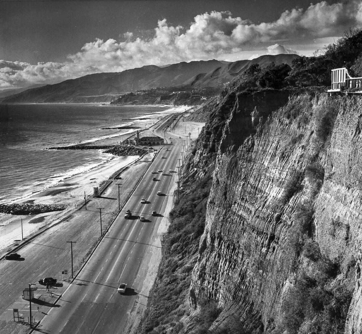 Feb. 19, 1960: A view of Pacific Coast Highway at Will Rogers State Beach in Pacific Palisades. The building at the center of the photo is a lifeguard tower and offices for the state beach.