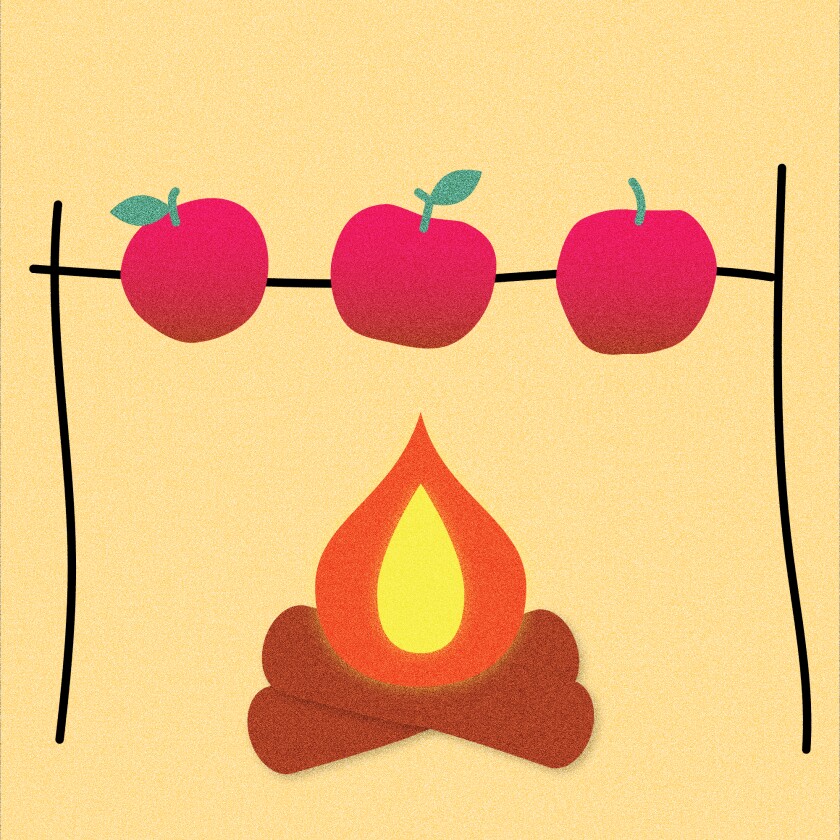 Illustration of apples cooking over a fire