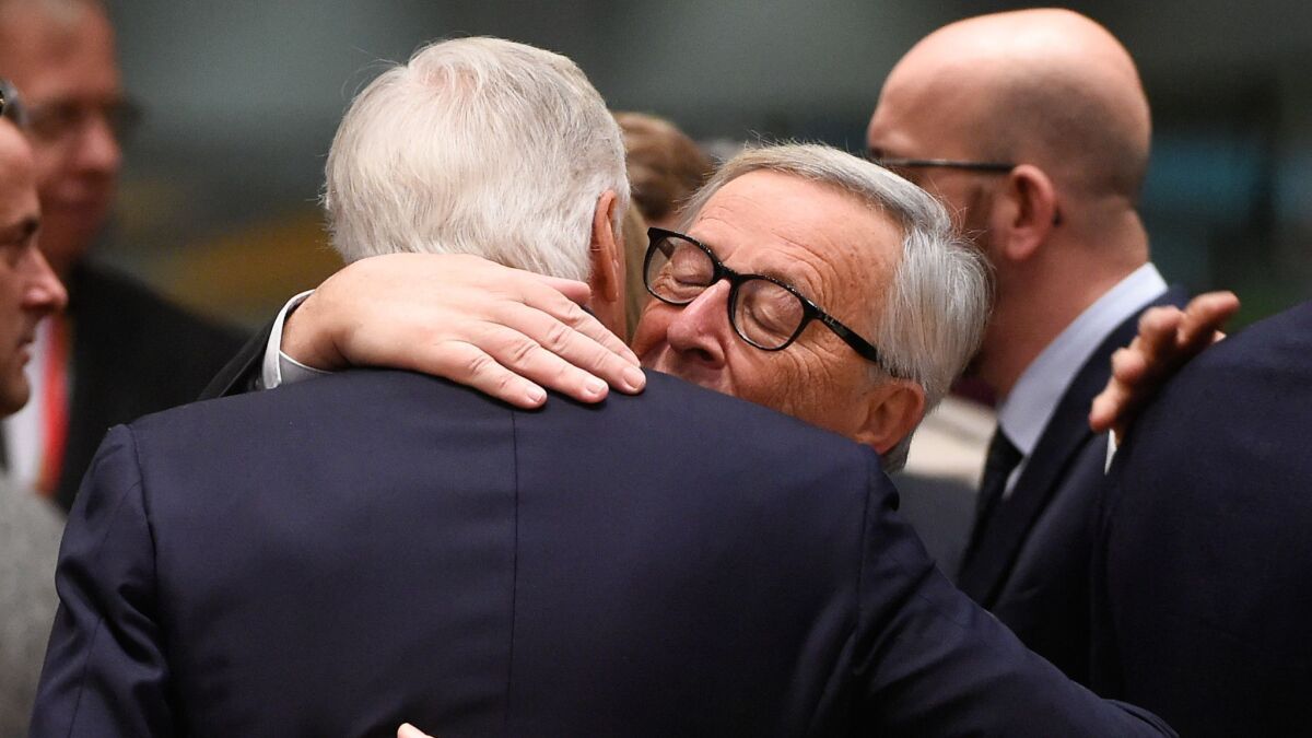 European Commission President Jean-Claude Juncker, right, with EU chief "Brexit" negotiator Michel Barnier on Nov. 25, 2018, in Brussels.