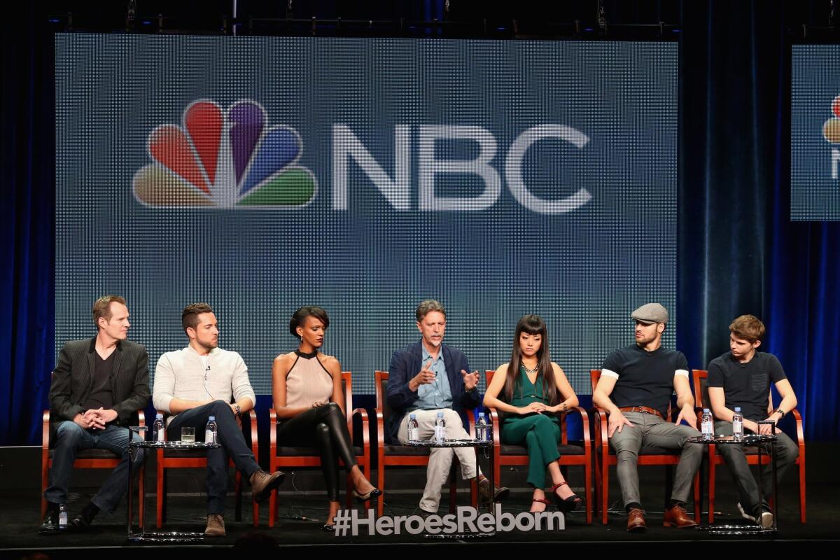 "Heroes Reborn" executive producer Tim Kring, center, with actors, from left, Jack Coleman, Zachary Levi, Judi Shekoni, Kiki Sukezane, Ryan Guzman and Robbie Kay.