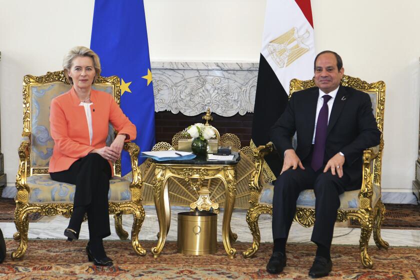 In this photo provided by Egypt's presidency media office, Egyptian President Abdel-Fattah el-Sissi, right, meets European Commission president Ursula Von der Leyen, at the Presidential Palace in Cairo, Egypt, Sunday, March 17, 2024. (Egyptian Presidency Media Office via AP)