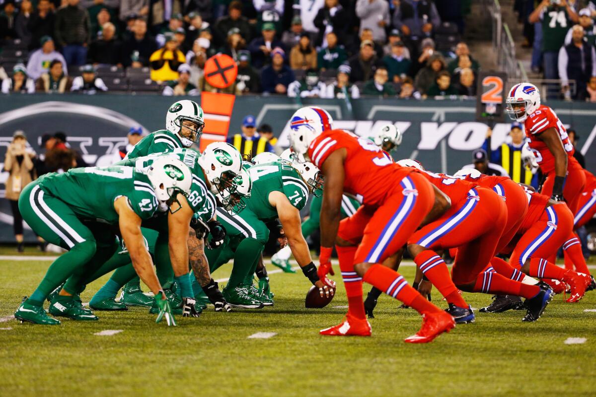 The New York Jets and the Buffalo Bills line up before a play during their "Thursday Night Football" game at MetLife Stadium on Thursday.