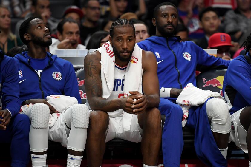 LOS ANGELES, CALIFORNIA - OCTOBER 10: Kawhi Leonard #2 of the LA Clippers on the bench after playing the first half during a 111-91 Denver Nuggets preseason win at Staples Center on October 10, 2019 in Los Angeles, California. (Photo by Harry How/Getty Images)