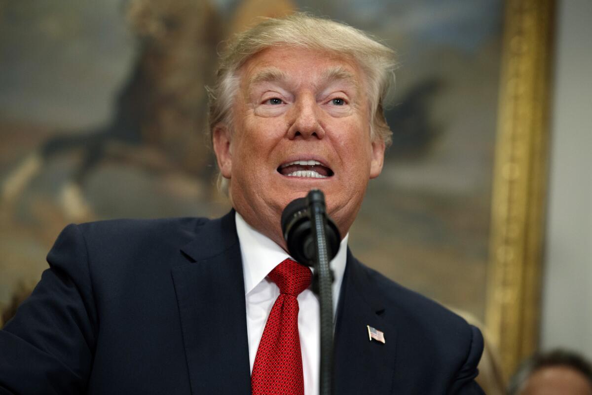 President Trump speaks before signing an executive order on healthcare at the White House on Oct. 12, 2017.