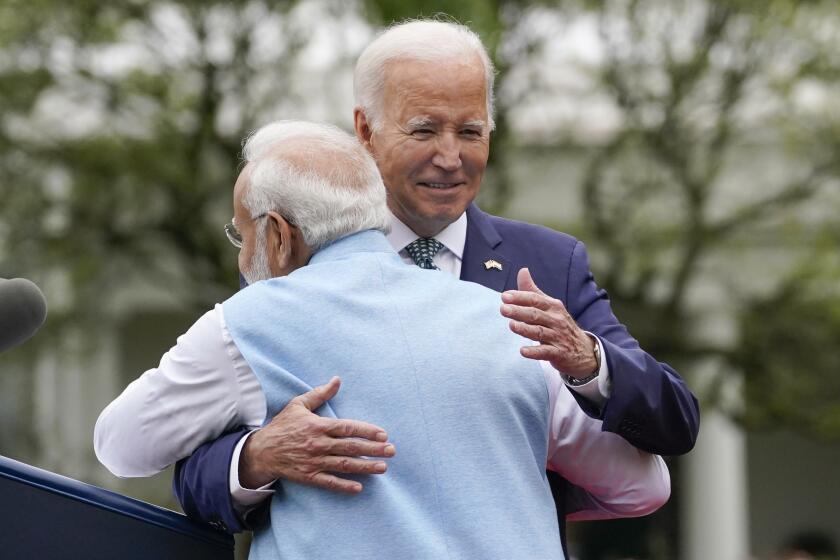 India's Prime Minister Narendra Modi embraces President Joe Biden during a State Arrival Ceremony on the South Lawn of the White House, Thursday, June 22, 2023, in Washington. (AP Photo/Evan Vucci)