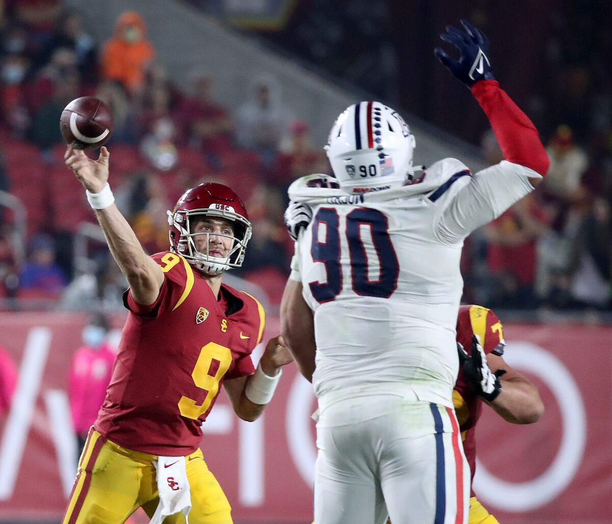 USC quarterback Kedon Slovis throws a pass against Arizona.