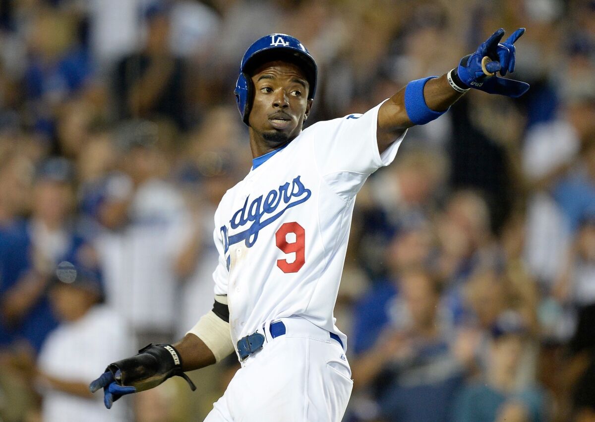 Dee Gordon reacts during a game against the Milwaukee Brewers at Dodger Stadium on Aug. 15.