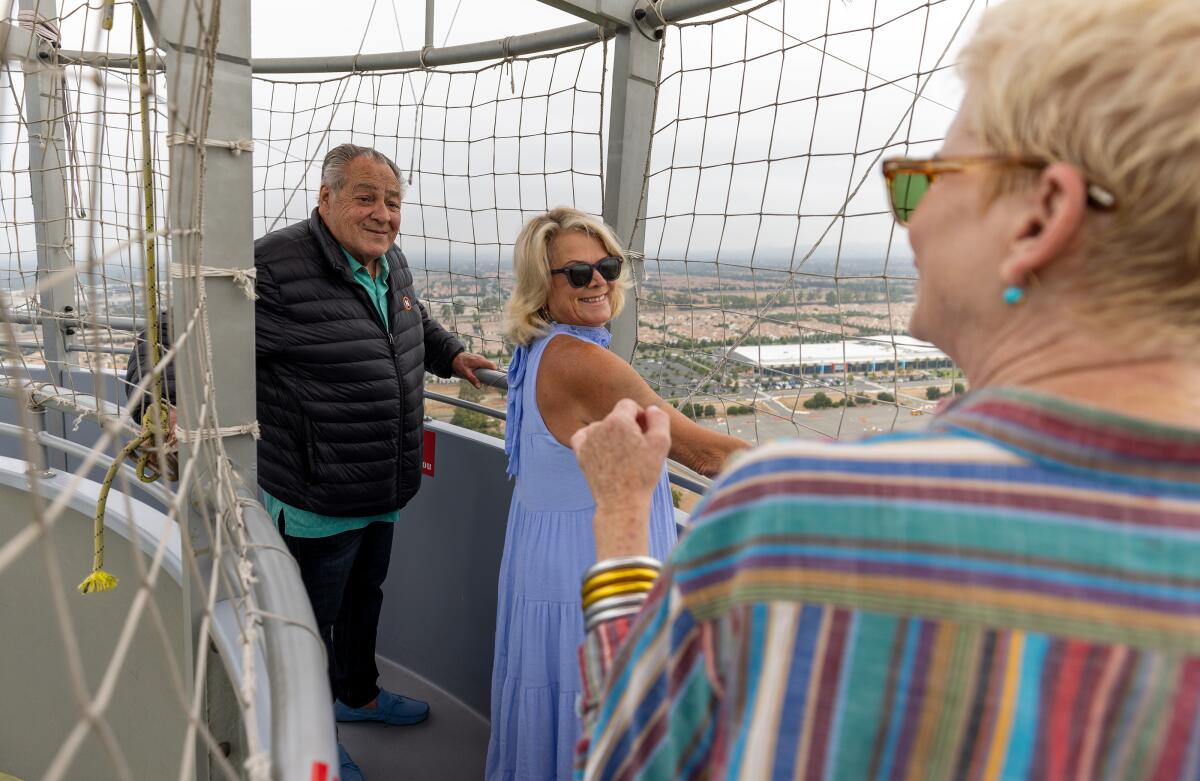 Frank DiBella, 77, and Bonnie Nollan, 56, residents of Newport Beach, ride in the Great Park Balloon on Monday.