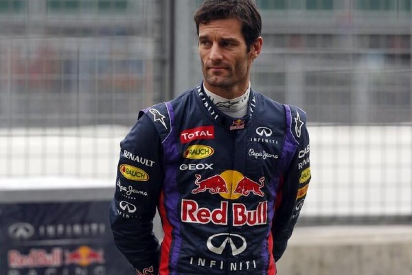 Red Bull driver Mark Webber of Australia watches practice Friday for Sunday's British Grand Prix at the Silverstone circuit.