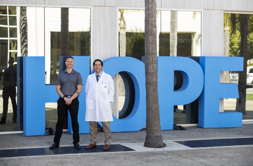 City Of Hope Newport Beach Preaches Colorectal Cancer Awareness - Los Angeles Times 2 Will Godoy, left, and his oncologist Dr. Misagh Karimi at City of Hope Newport Beach.