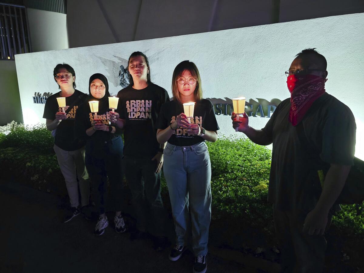 Anti-death penalty activists at a candlelight vigil