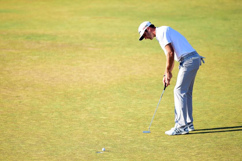 Dustin Johnson misses an eagle putt on the 18th green and a chance to win the U.S. Open at Chambers Bay on June 21.