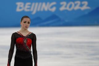 A dejected Kamila Valieva from Russia after skating the women's single skating-free skating program