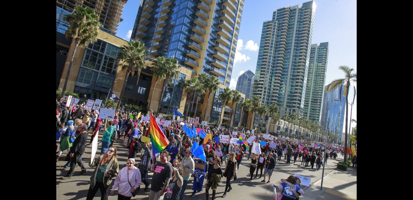 People walk down Pacific Highway during the San Diego Women's March.