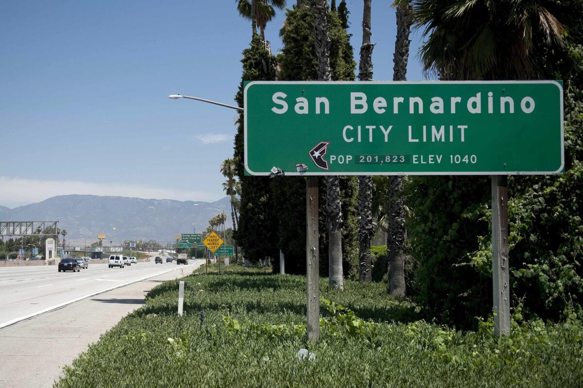 FILE - A San Bernardino sign on I-10 East is seen on July 11, 2012 in San Bernardino, Calif. A federal judge has closed out the bankruptcy case filed by the Southern California city that grappled with a dire cash shortage a decade ago, officials said Monday, Sept. 12, 2022. The city of San Bernardino said in a statement that U.S. Bankruptcy Judge Scott Clarkson last week closed the case filed in August 2012. (AP Photo/Grant Hindsley, File)
