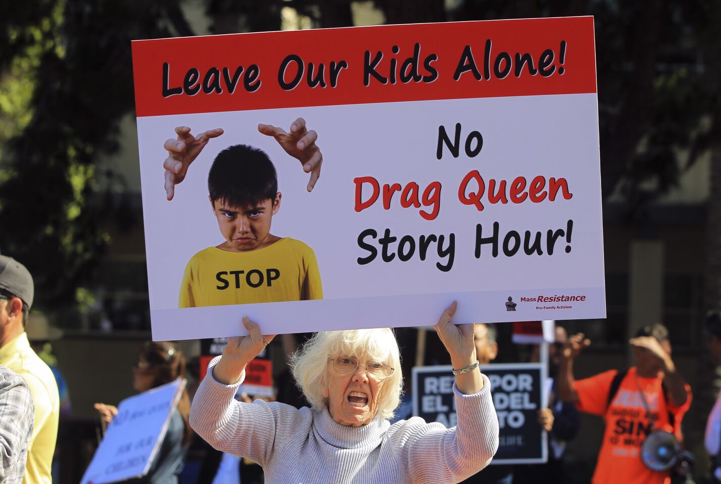 Karen Grube yells at supporters of the Drag Queen Story Hour while she stands with protesters against the story hour at the Chula Vista Public Library Civic Center Branch on Tuesday, September 10, 2019 in Chula Vista, California.