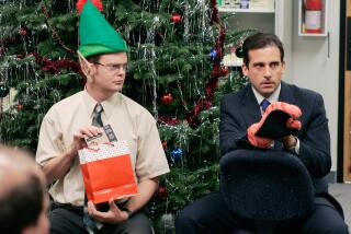 THE OFFICE -- "The Christmas Party" Episode 10 -- Aired 12/06/2005 -- Pictured: (l-r) Rainn Wilson as Dwight Schrute and Steve Carell as Michael Scott -- Photo by: Paul Drinkwater/NBCU Photo Bank