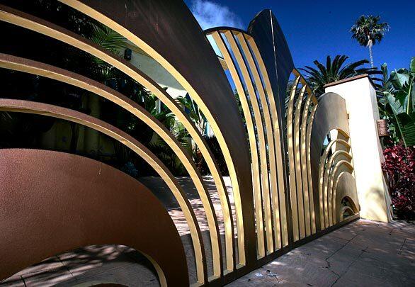 Here's to the creative residents of Malibu and the architects, woodworkers, glass artisans and metal sculptors they employ to build the sometimes interesting, sometimes gorgeous, sometimes bizarre and (we are the first to admit) sometimes cheese-ball gates for them. Times staffer and Malibu resident Ken Hively photographed some of the most interesting of these gates, giving us a glimpse of the sensibility that lies beyond those forbidden driveways. -- Deborah Netburn