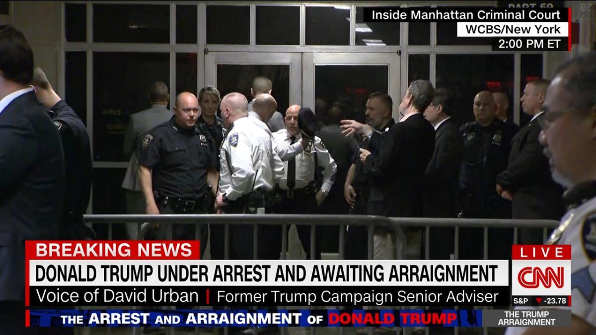CNN coverage of the arraignment of Donald Trump on April 4, 2023.