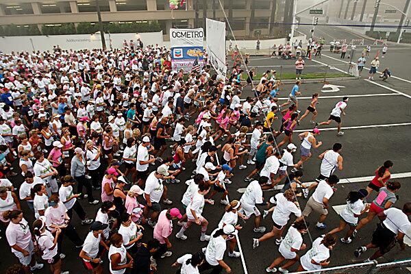 An estimated 30,000 breast cancer survivors, supporters and activists participated in the 2009 Susan G. Komen Orange County Race for the Cure in Newport Beach on Sunday.