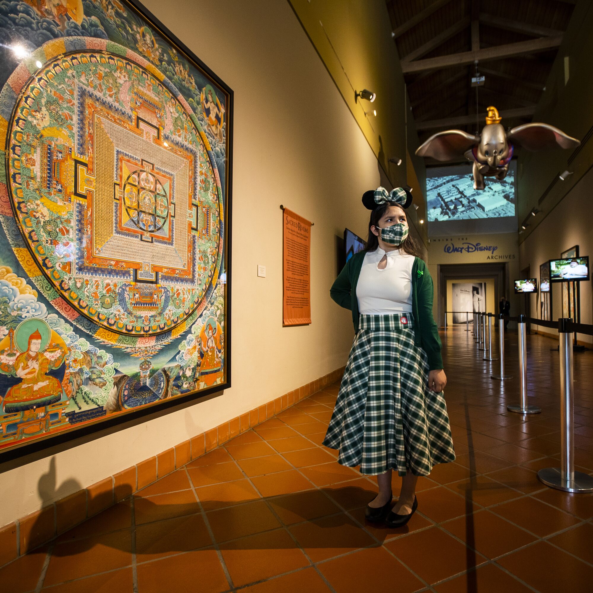 Lali Cervantes, 13, of Covina, views an exhibit at the Bowers Museum in Santa Ana. 