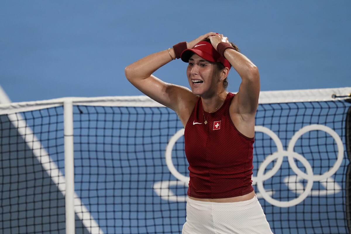Belinda Bencic of Switzerland celebrates after defeating Marketa Vondrousova of the Czech Republic.