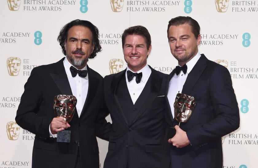 "The Revenant's" Alejandro G. Iñarritu, left, and Leonardo DiCaprio, right, at the British Academy Film Awards with Tom Cruise, who presented DiCaprio his award.