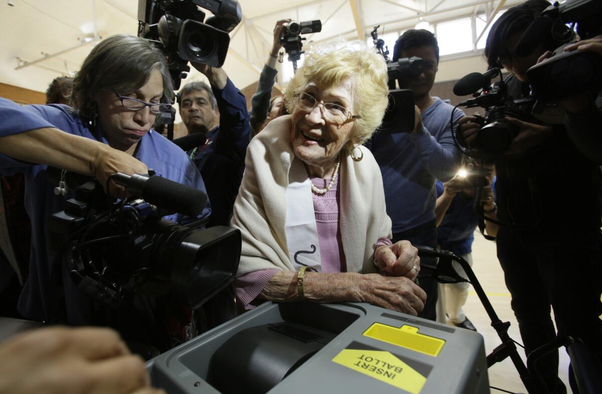 Guadelupe Portillo, 102, of Los Angeles votes in her first election since becoming a naturalized citizen. She cast her ballot at Montecito Heights Recreation Center.