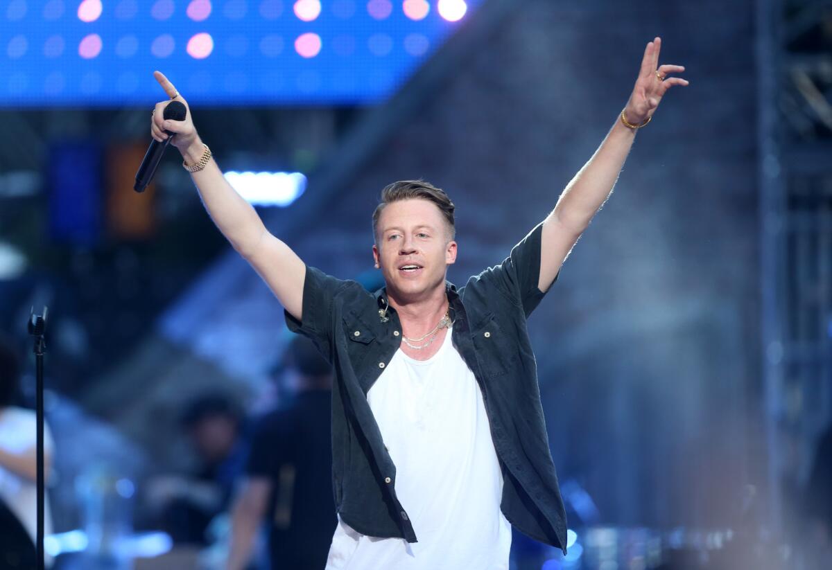 Macklemore performs during the MTV Video Music Awards at the Orpheum Theatre on Aug. 30.