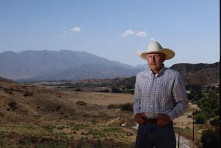 Yucaipa, CA - September 04: David Matuszak, has lived on a small horse ranch in Live Oak Canyon for the past 40 years. He's the president of Friends of Live Oak Canyon, which he describes as a grassroots environmental homeowners association, and is opposed to the city of Yucaipa that is considering building two, 1-million-square-foot warehouses in the Live Oak Canyon in in Yucaipa Wednesday, Sept. 4, 2024. Residents are upset that the city of Yucaipa is considering building two, 1-million-square-foot warehouses in the Live Oak Canyon area. They say the warehouses will spoil natural areas, increase pollution and congestion and change the rural character of the city, which refers to itself as the jewel of the Inland Empire. The proposed project site is located about a half-mile from a preserve known as Quail Canyon and will be visible from its hiking, biking and equestrian trails.(Allen J. Schaben / Los Angeles Times)