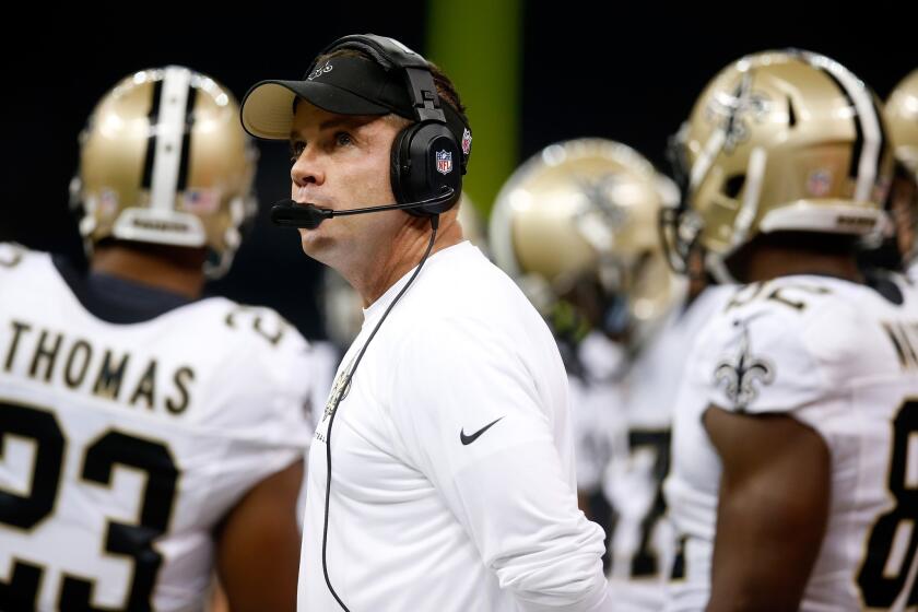 New Orleans Coach Sean Payton stands on the sideline during a game against Arizona in 2013.
