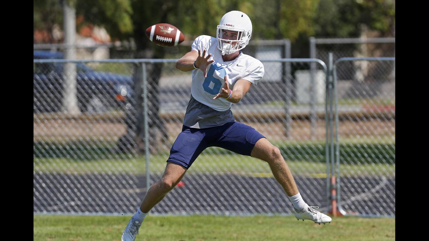 Corona del Mar High wide receiver John Humphreys goes up for a pass during practice on Wednesday in Newport Beach.