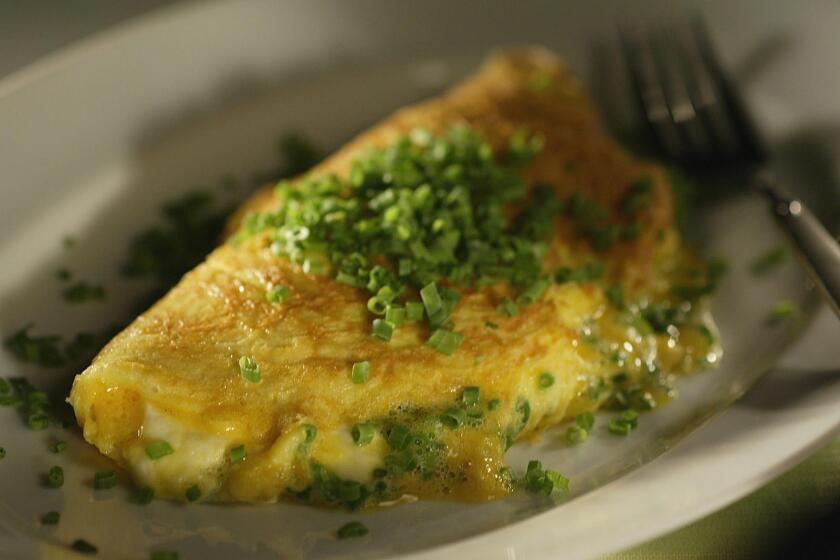 091034.fo.1214.food10.gf Chive goat cheese omelet