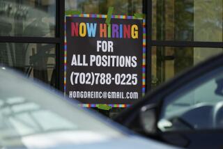 A hiring sign is displayed at a restaurant in Mount Prospect, Ill., Tuesday, Aug. 27, 2024. (AP Photo/Nam Y. Huh)