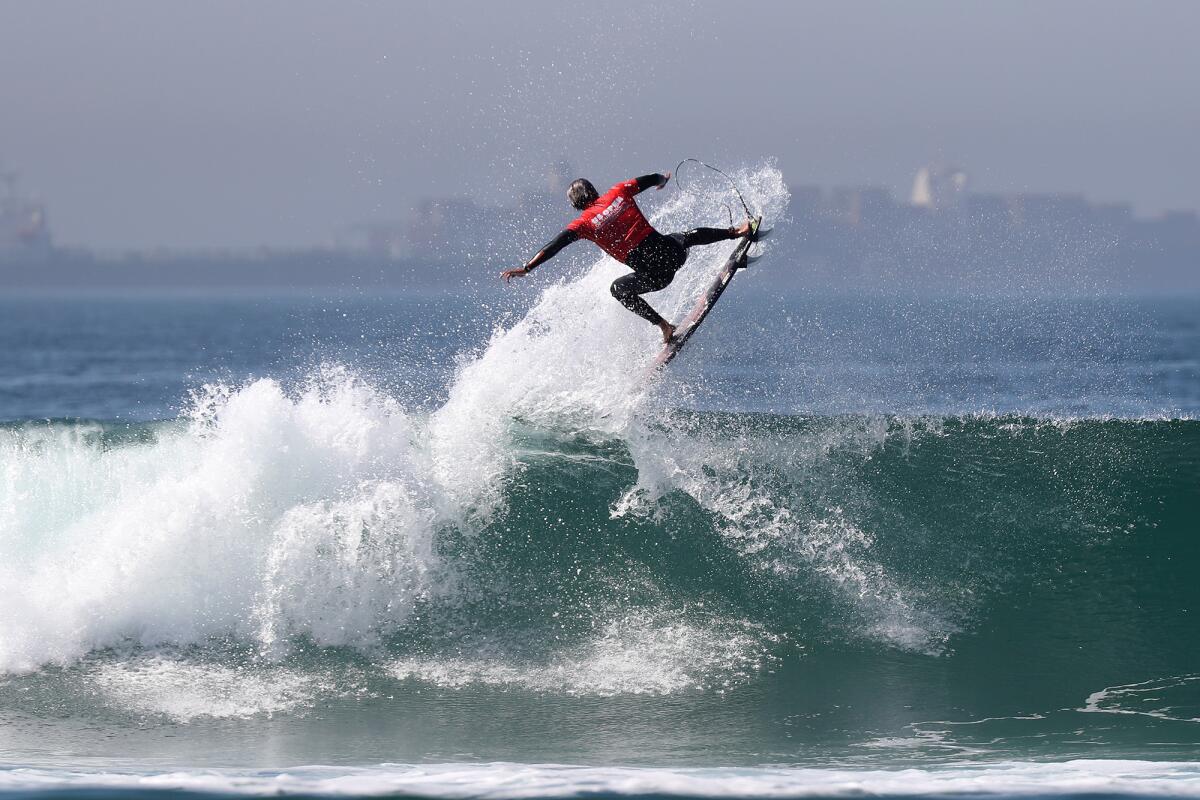 Huntington Beach's Kanoa Igarashi does a backside 360 as he competes in the U.S. Open of Surfing last year.
