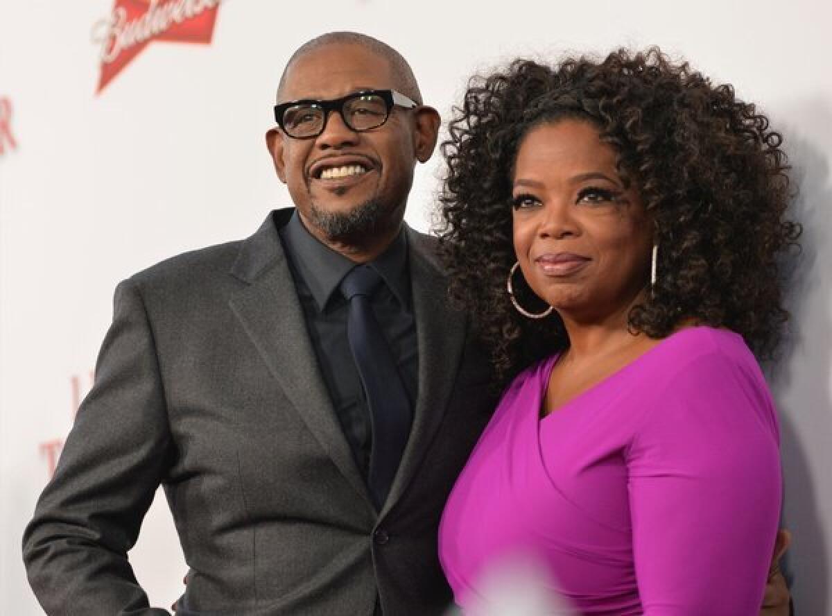 Forest Whitaker and Oprah Winfrey attend the premiere of "Lee Daniels' The Butler" in Los Angeles. The pair could be a fixture on the awards circuit this year.