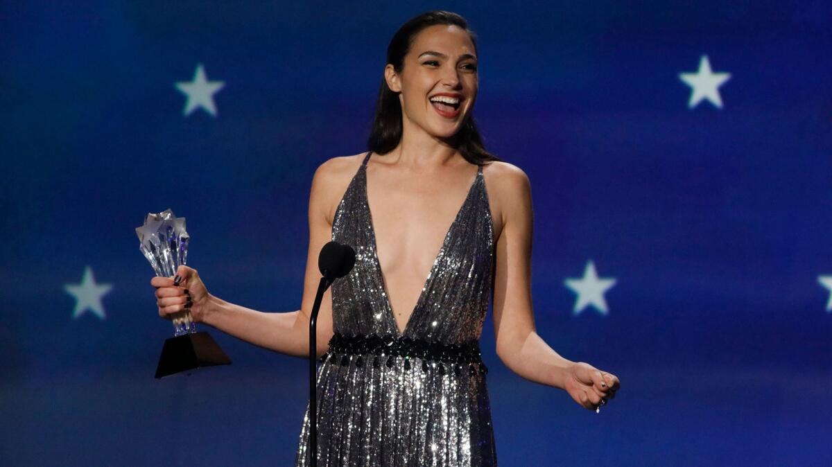 "Wonder Woman's" Gal Godot accepts the #SeeHer Award, given to an honoree "who embodies the values set forth by the #SeeHer movement" during the 23rd Critics' Choice Awards.