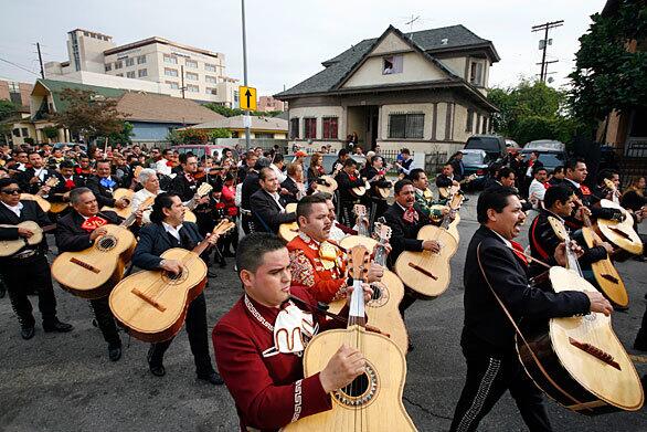 Hundreds of mariachis take part in the annual procession in honor of St. Cecilia, patron saint of music, at 1st Street and Boyle Avenue.
