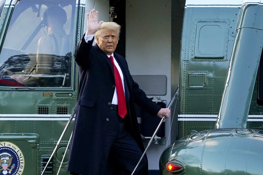 Former President Trump, here leaving the White House for the last time, has named two lawyers to his defense team.