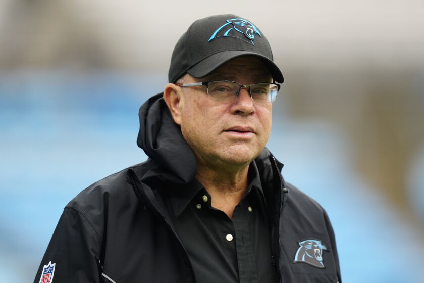 FILE - Carolina Panthers owner David Tepper watches during warm ups before an NFL football game between the Carolina Panthers and the Denver Broncos on Sunday, Nov. 27, 2022, in Charlotte, N.C. A sheriff in South Carolina has announced his deputies started a criminal investigation into whether Tepper or his company misused public money meant for a failed practice facility. (AP Photo/Jacob Kupferman, File)