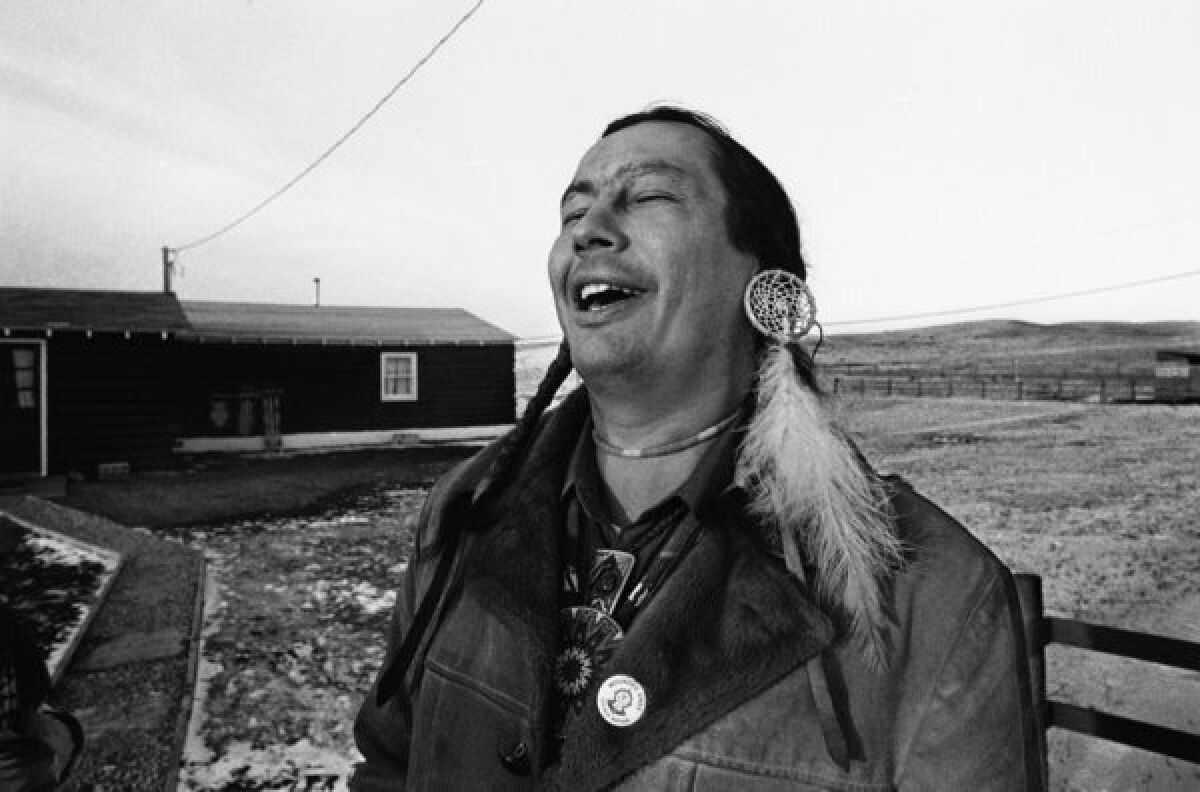 Russell Means was an early leader of the American Indian Movement (AIM) and led its armed occupation of the South Dakota town of Wounded Knee, a 71-day siege that included several gunbattles with federal officers.