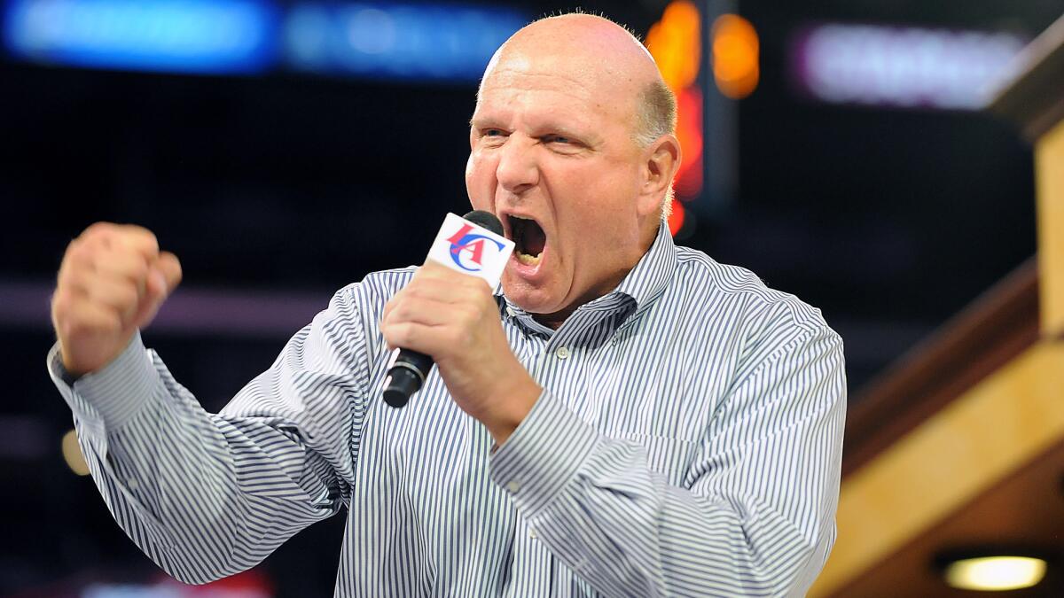 Clippers owner Steve Ballmer speaks during a rally at Staples Center in August. Will Ballmer's overenthusiastic demeanor become his courtside trademark?